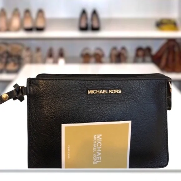 Michael Kors Black Leather Wristlet Comes w/booklet & orig packing. - Picture 7 of 10